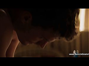 brown-haired Dakota Johnson smacked and tongued out